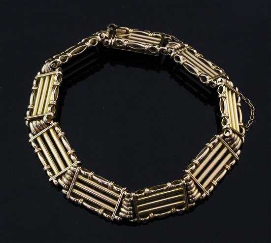 An Edwardian 15ct gold gate link bracelet, 7.25in.